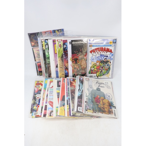 53 - A selection of assorted comics to include DC Wonder Woman, The Joker, Signed Bill Morrison The Beatl... 