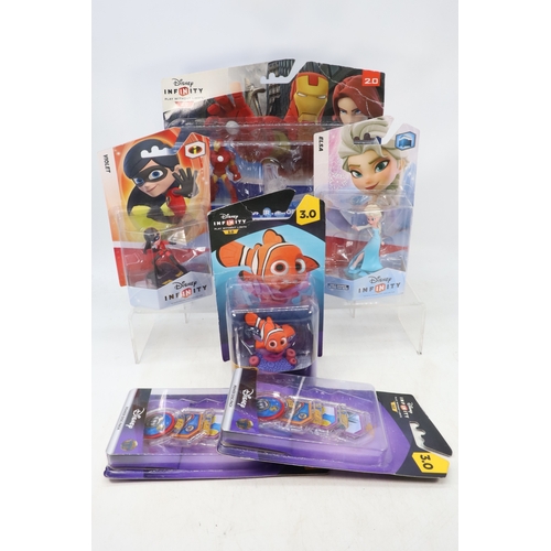 94 - Disney infinity PS3 starter pack, together with a selection of figures including Frozen, Dora, Lone ... 