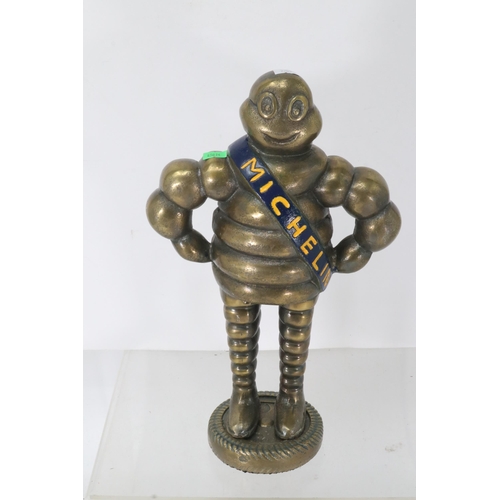 333 - Bronze colour Michelin man measures approx. 14.5''