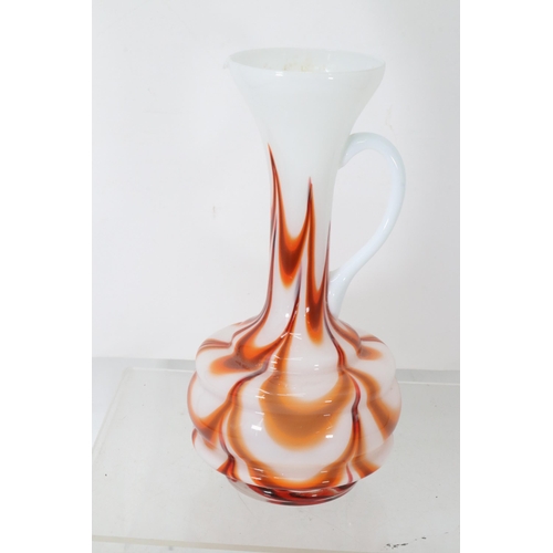 370 - A mid-century glass vase made in Italy, possibly by Stelvia. Measuring approx. 32cm tall with classi... 