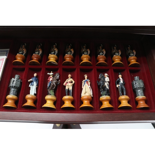 482 - Franklin Mint, battle of Waterloo chess set with table and a Battle of Waterloo draughts set.