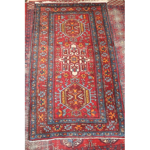 488 - Bokhara Turkmen? rug measures approx. 126cm x 166cm together with a smaller rug measures approx. 84c... 