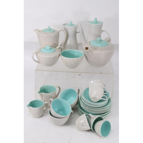 496 - A selection of Poole Pottery Twin-tone teaware.