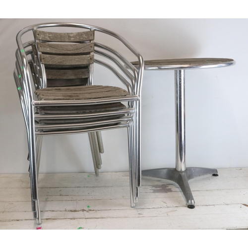 516 - Four aluminium chairs and table