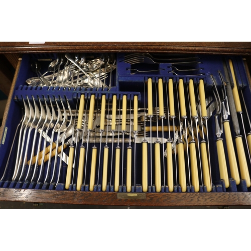 197 - Oak two drawer, canteen of cutlery on barley twist legs,