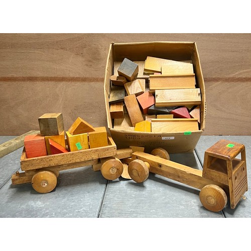 372 - A Wooden Lorry and trailer, together with a large selection of assorted blocks