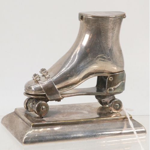 11 - An inkwell in the form of a Rollerskate on plinth