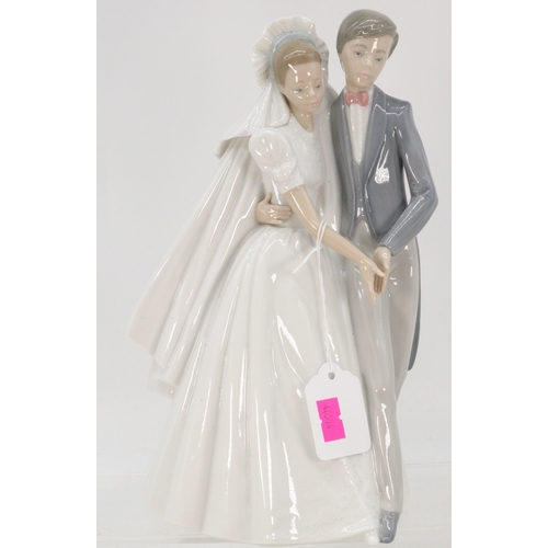 80 - A Nao figural group Bride and Groom