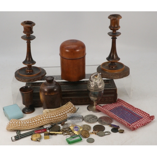 95 - A wooden carved glove box together with pair of turned candlesticks, fruitwood pot and cover, and si... 