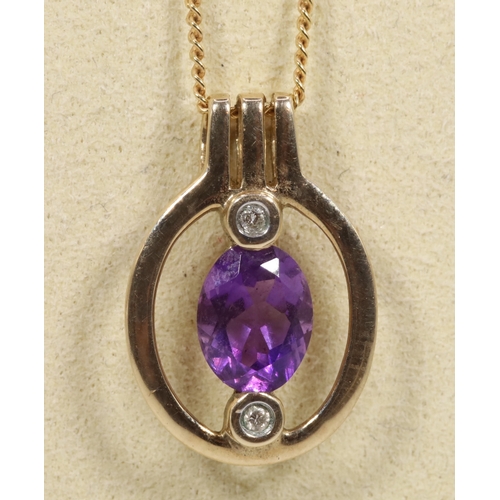 128 - A 9ct gold fine chain together with a 9ct gold pendant set with two diamonds and central amethyst (a... 