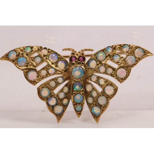 151 - 9ct Gold butterfly brooch set with opals.