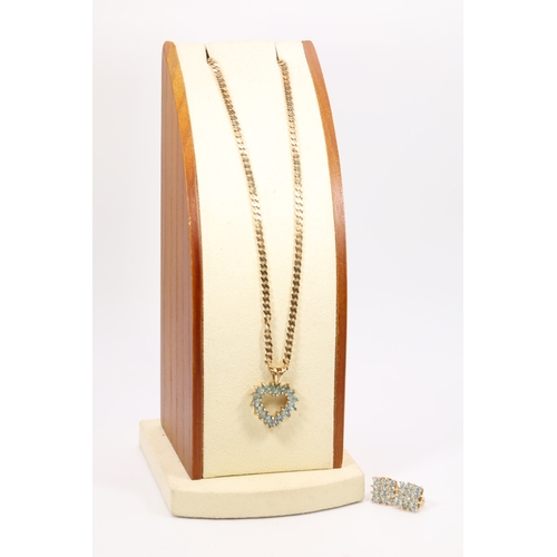 192 - 9ct Gold chain with blue stone heart pendant, and a pair of matching earrings.