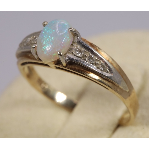 201 - A 9ct gold dress ring set with synthetic opal (approx. 2.6g)