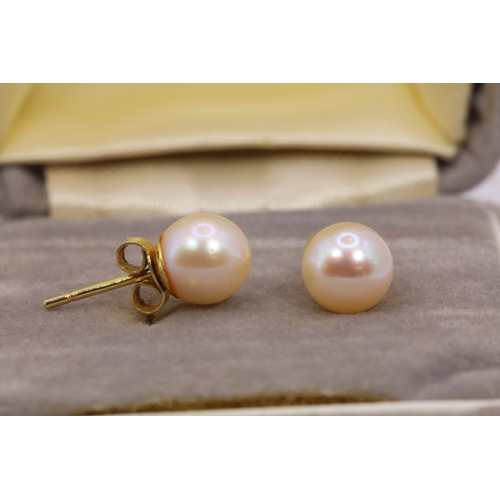 211 - Cultured Pearl Majorica necklace together with a pair of pearl earrings and 9ct gold stems.