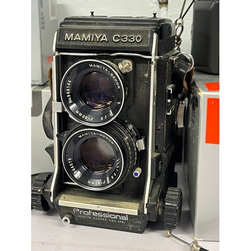 245 - Mamiya C330 professional TLR camera together with a Pentax SFX camera fitted with 28-50mm lens, empt... 