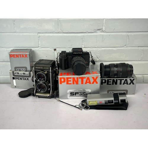 245 - Mamiya C330 professional TLR camera together with a Pentax SFX camera fitted with 28-50mm lens, empt... 