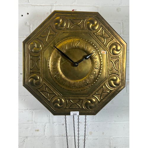 447 - Arts and craft style brass faced wall clock with weights and pendulum