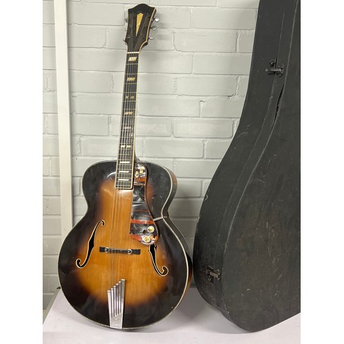 478 - A vintage tobacco sunburst accoustic Jazz guitar with hard fitted cast