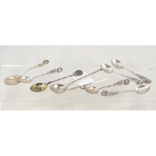 22A - A selection of silver and white metal continental spoons