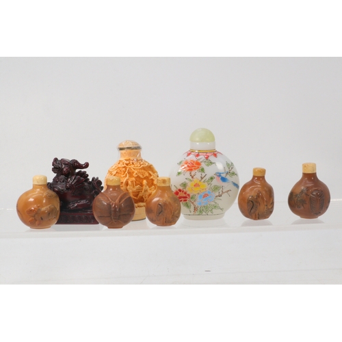 27A - A selection of decorative reproduction snuff bottles some with boxes