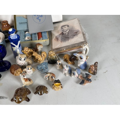 412 - Two boxed Hutschenruther plates, wade whimsies, doulton little nell figure, cameras and other sundri... 