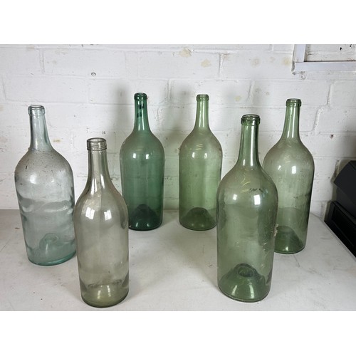 444 - Six vintage french empty glass bottles