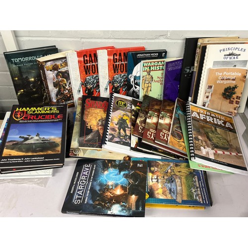 611 - Two cartons of war gaming interest rule books and similar interest including Osprey, many rule manua... 