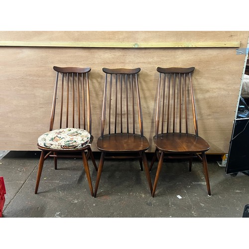 24 - Ercol drop leaf table and eight chairs