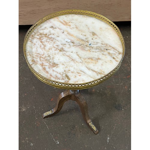 89 - Marble topped oak circular table with gilt metal gallery