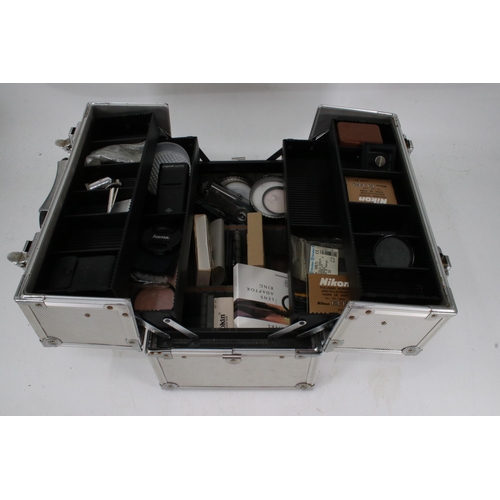 110 - A quantity of vintage and later camera flashes, filters and other accessories