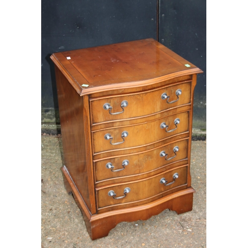 263 - Reproduction serpintine small chest of four drawers