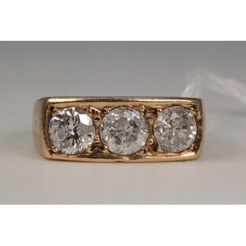 159 - A 9ct gold three stone diamond ring (approx. weight 13.7g)