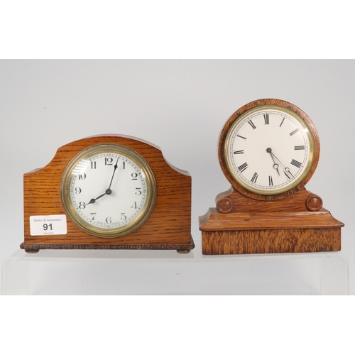 91 - Two small oak cased mantle clocks