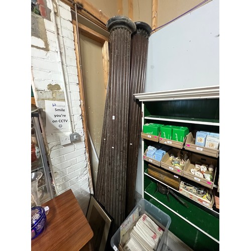 290 - Four tall wooden column pieces, approx. 8ft tall believed to make two columns or part of a wall disp... 