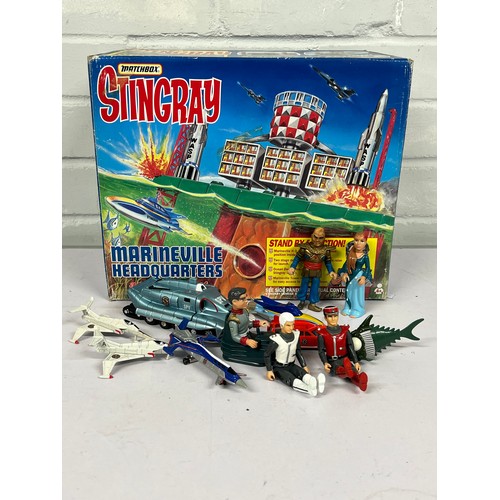 649 - Matchbox Stingray Marineville headquarters together with figures and diecast vehicles