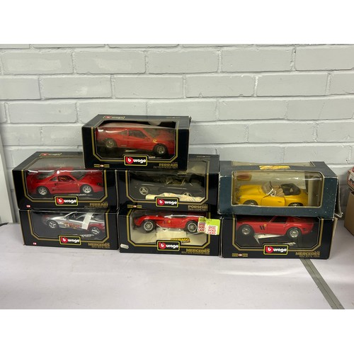 655 - Seven 1:18 Scale diecast model cars, to include Burago, Maisto models include Ferarri, Mercedes, Por... 