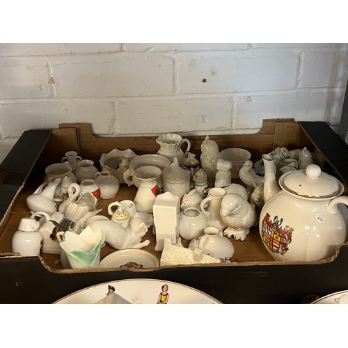 548 - Large quantity of crested ware including Goss, Carlton ware together with Goss collectors annual pla... 