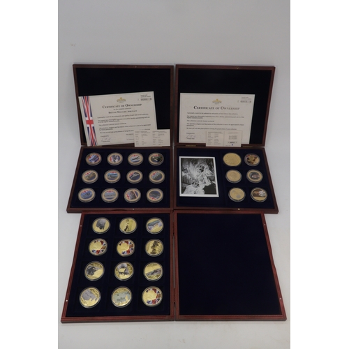 151 - Three wooden cased coin sets to include 75th Anniversary of WWII 12 coin set, Windsor Mint Queen Eli... 