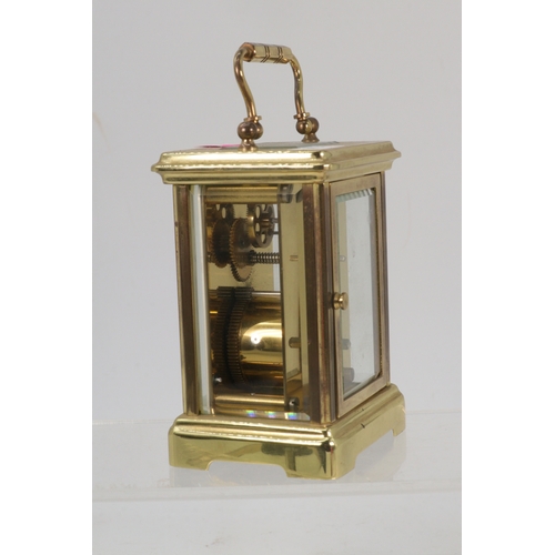 186 - A brass cased carriage clock by Rapport