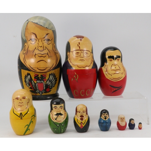 254 - Two Babushka Stacking dolls in the form of presidents