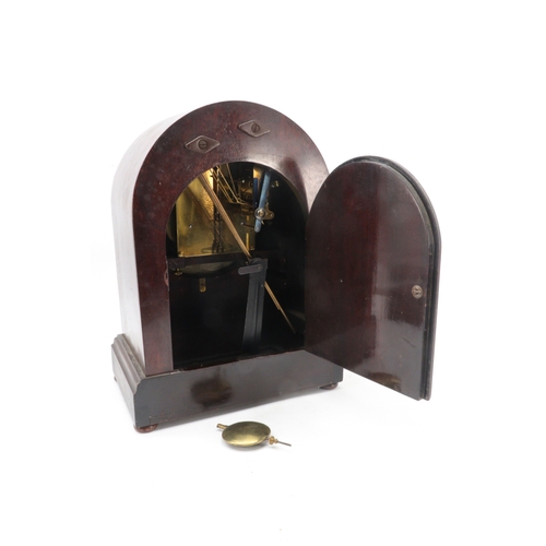 493 - A wooden cased chiming mantle clock