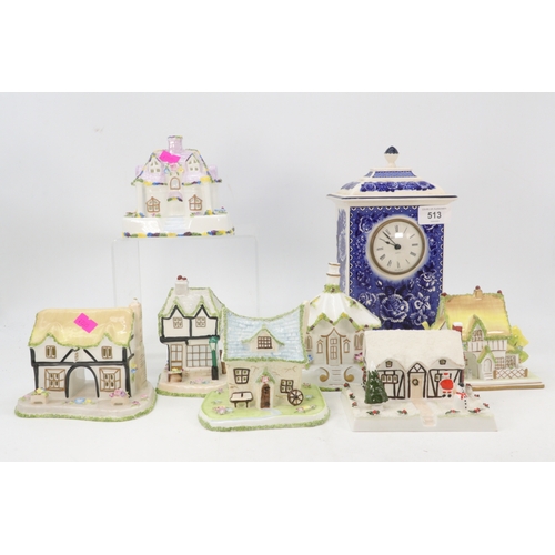 513 - A selection of Coalport cottages together with a Wedgwood Golden Jubilee clock