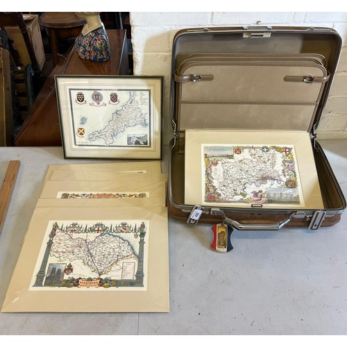 486 - A vintage suitcase together with a quantity of map prints Durham, Yorkshire etc (9 in mounts and one... 