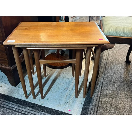 504 - A nest of three mid-century tables stamped Furniture Makers Danish Control noted sun fading and scra... 