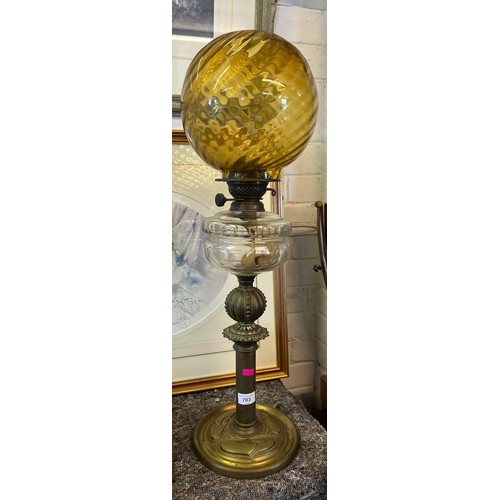 703 - Ornate Art Nouveau brass column oil lamp with clear glass reservoir and later associated shade