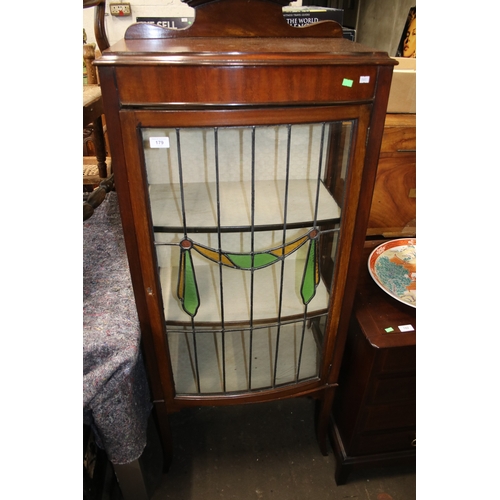 179 - Glazed display cabinet with stained glass motif measures approx. 59cmW x 32cmD x 152cmH