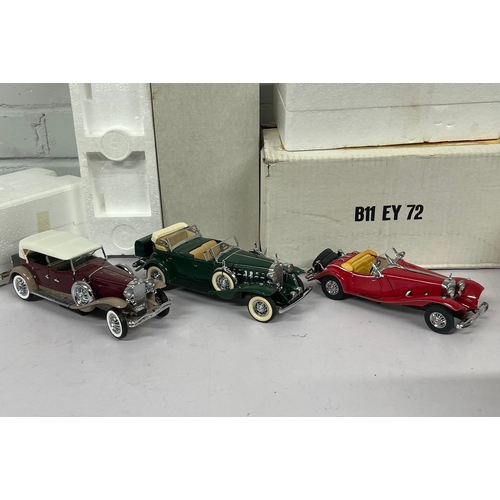 229 - Franklin Mint Mercedes 500K roadster together with 1930 Duesenburg and a Danbury Mint Cadillac