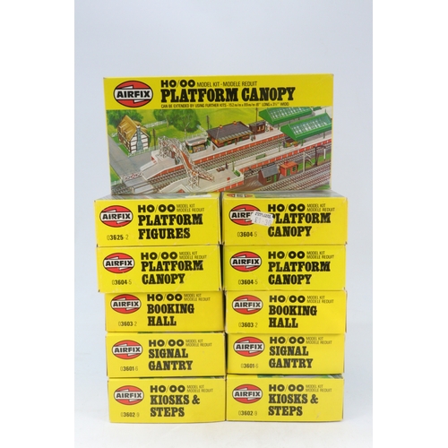 191 - 11 Airfix OO gauge models kits to include Platform Canopy, booking hall, signal gantry etc