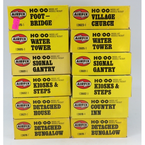 202 - Twelve airfix OO gauge model kits to include Village Church, Country Inn, Footbridge etc