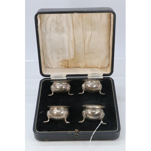 240 - Cased set of four silver salts, three with glass liners (approx. weight 130g without liners)